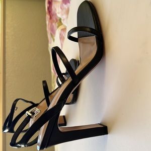 Black strappy shoes with ankle strap